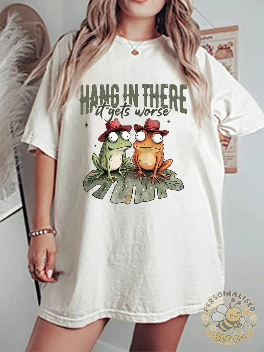Hang In There It Gets Worse Funny Frogs Wearing Hats Graphic T-Shirt