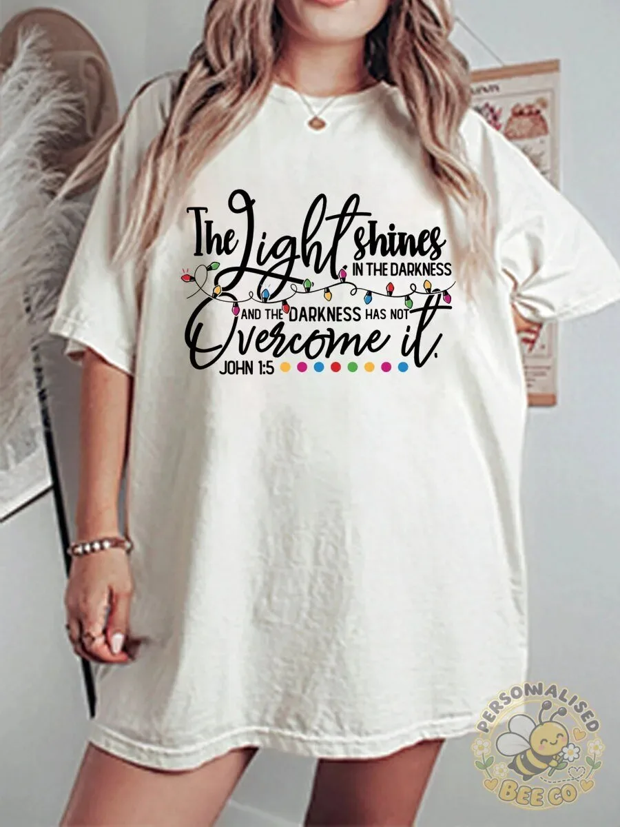 The Light Shines In The Darkness John 1:5 Bible Verse Graphic T-Shirt